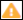 Here is an image of a yellow triangle indicating an alert for a QC check for the layer.